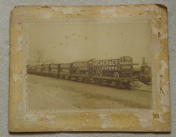 AC&Co containers on railway wagons.